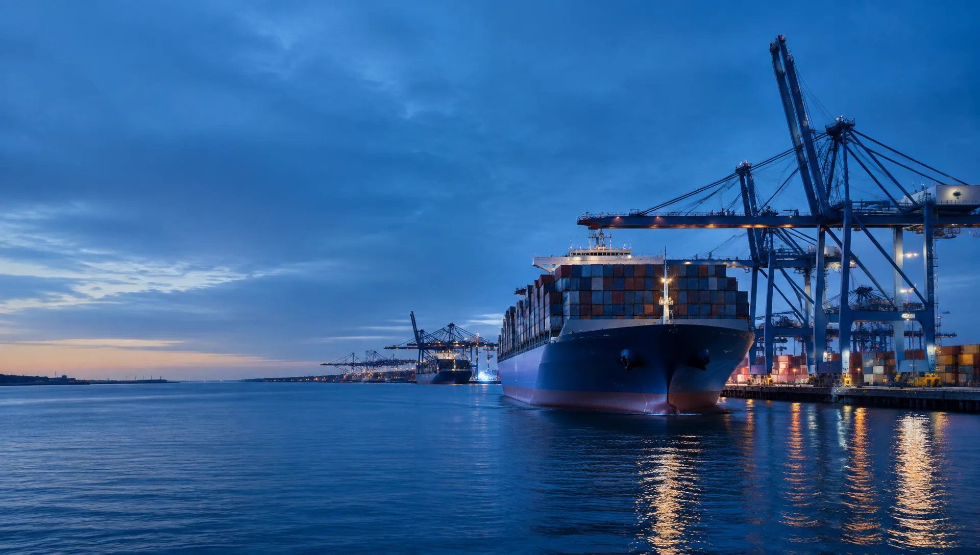 Commercial cargo vessel at an active container port